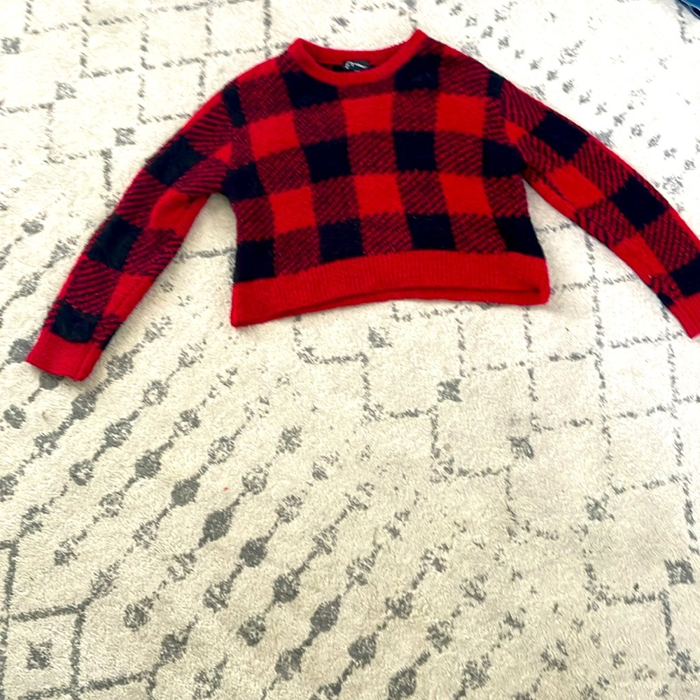 Plague jacket size 8 with stripes.